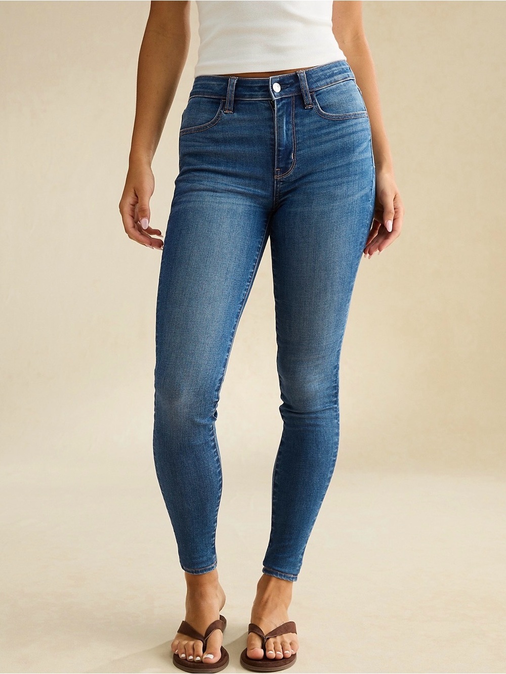 American Eagle High-Waisted Skinny Jegging Jeans in Brilliant Blue. 4 Short